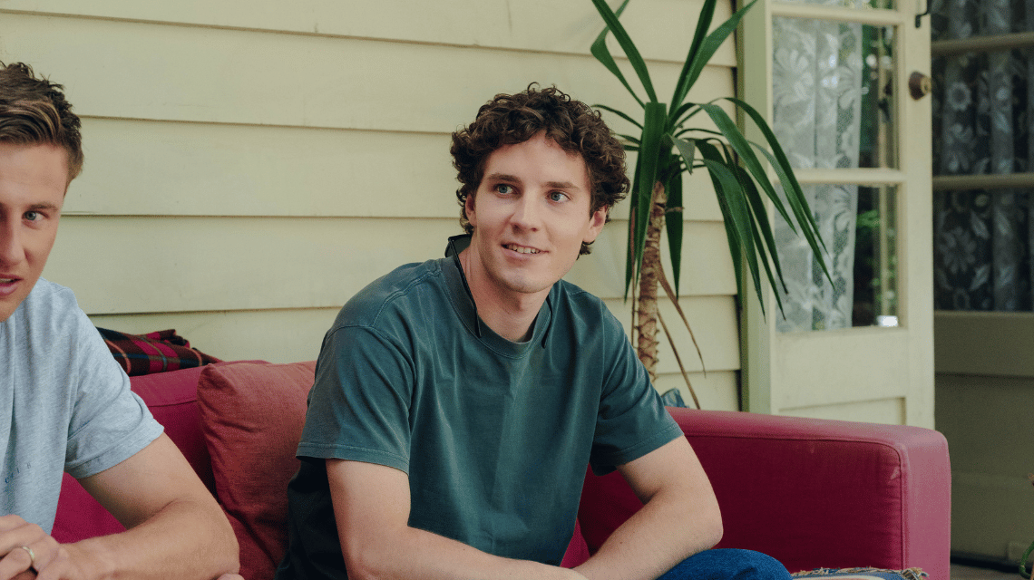 Ben, a What Kind of Man Do You Want to Be participant, chatting with friends.
